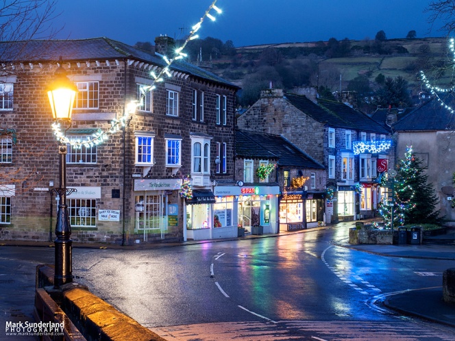 Fairy lights on the bridge and the High Street at Pateley Bridge at Christmas